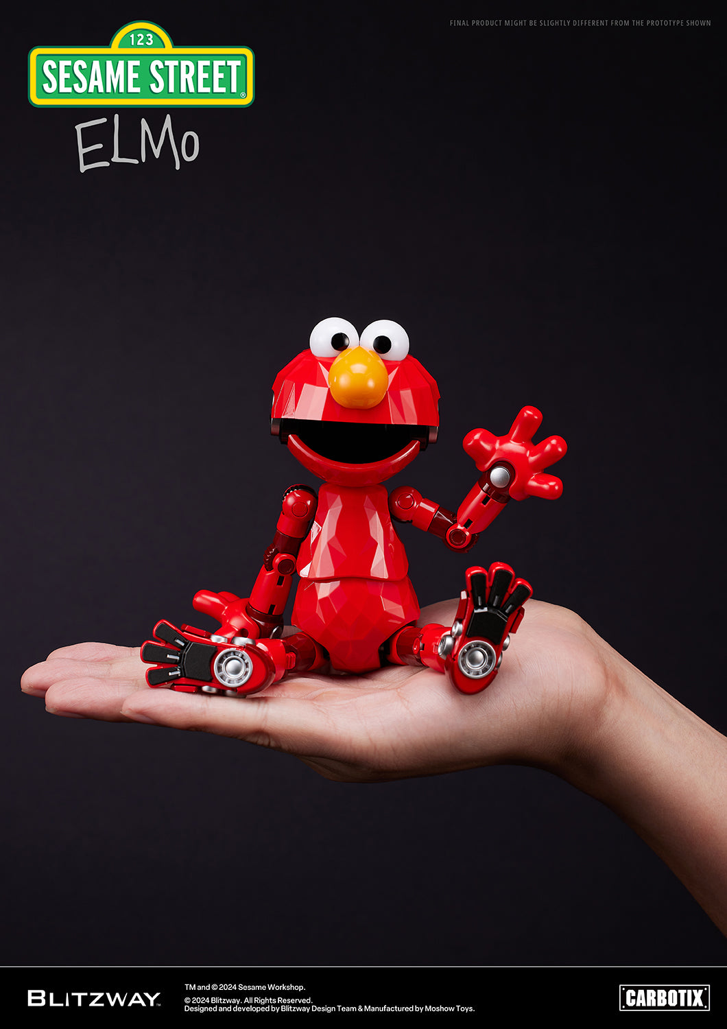 Elmo figure from Blitzway's Carbotix line sitting on a human hand, smiling and waving, showcasing its compact size.