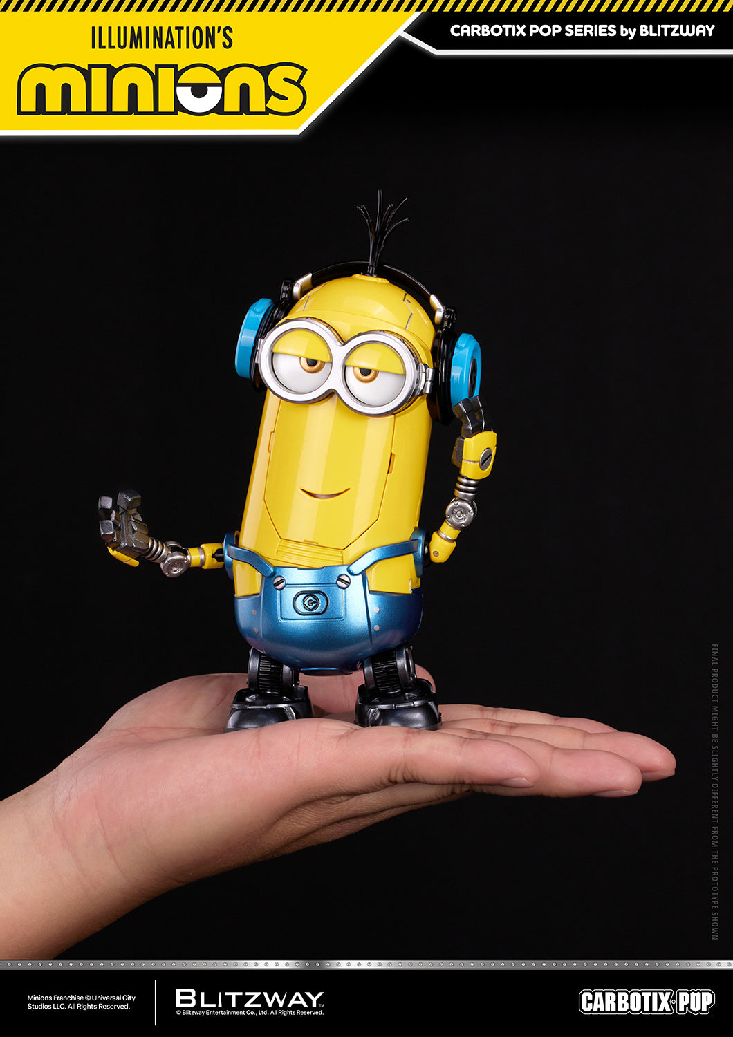 Kevin from the Carbotix Pop Minions Action Figure series displayed on a person's hand, showcasing the figure's compact size, articulated robot body, signature tall silhouette, and removable headphones accessory.