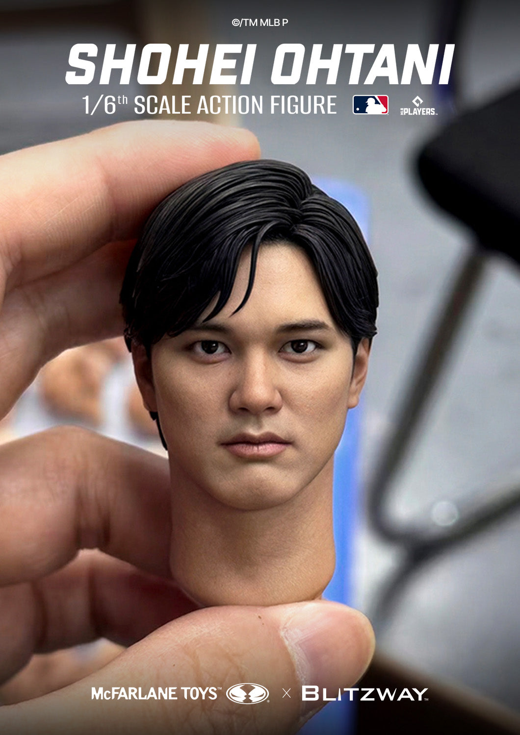 Close-up of the Shohei Ohtani 1/6 Scale Action Figure Deluxe Version head sculpt by McFarlane Toys and Blitzway, showcasing highly realistic facial likeness, detailed hair sculpt, and lifelike paint application while being held for size reference.