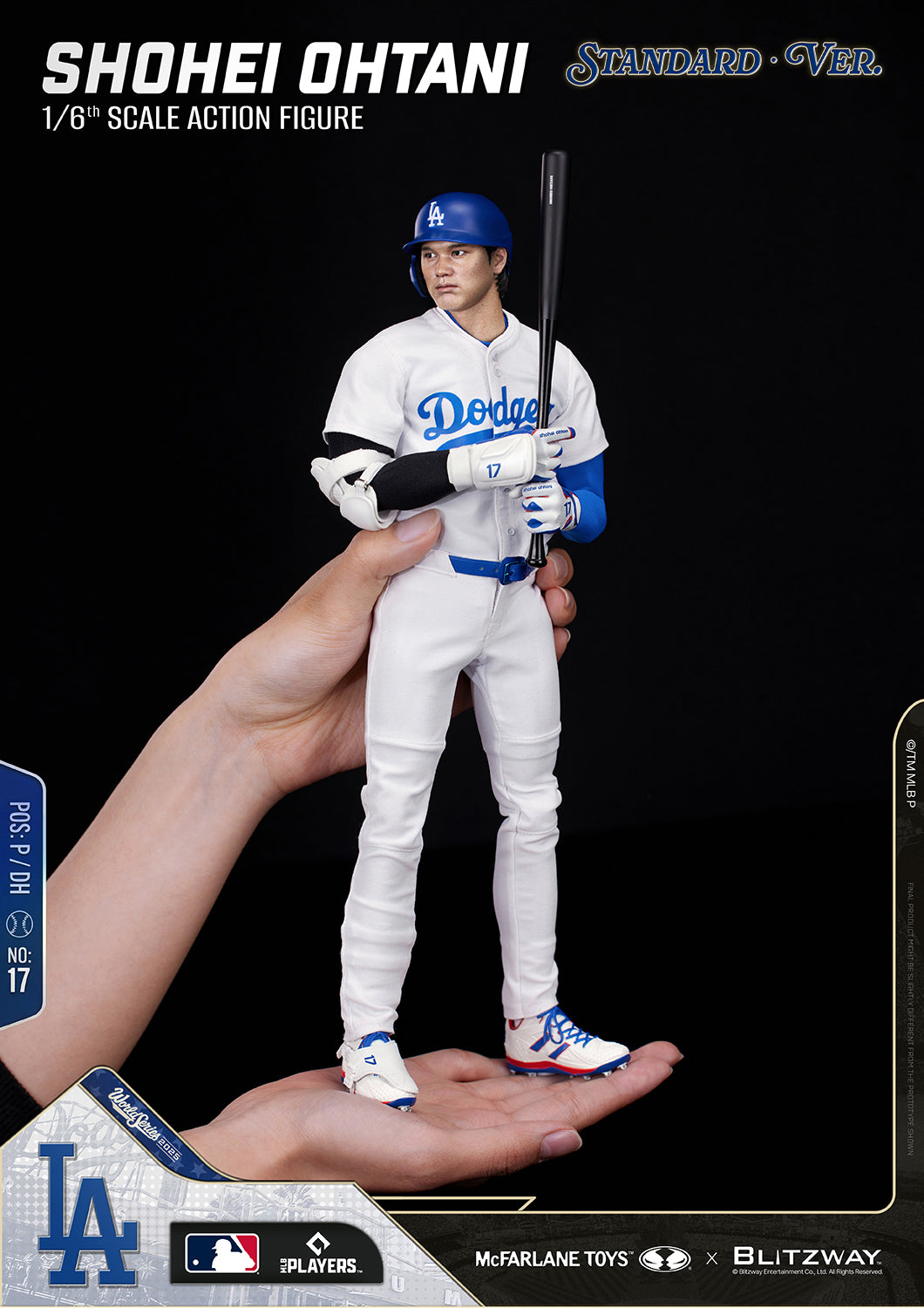 Shohei Ohtani 1/6 Scale Action Figure Standard Version shown in hand for size comparison, wearing the Los Angeles Dodgers home uniform and holding a baseball bat in a batting stance.