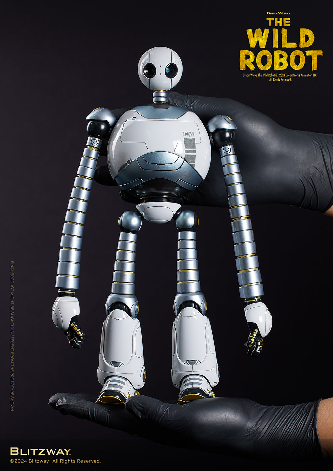 The Wild Robot figure held in gloved hands to show scale, emphasizing its height and craftsmanship against a dark background.
